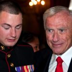 Combat wounded US Marine Lance Cpl Matt Bradford and 2009 Honoree of the Year Arnold Fisher.