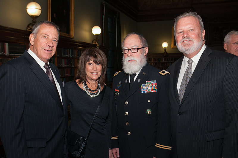 2014 Honoree of the Year Jan Scruggs, his wife Becky, Chaplain (Col) Jacob Goldstein from the 1st Mission Support Command Ft. Buchanan, Puerto Rico and Friends of the Vietnam Veterans Plaza Board Member John Campbell