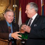 Congressional Medal of Honor Recipient Paul Bucha presents the Phelps Award to 2014 Honoree Jan Scruggs, Founder of the Vietnam Veterans Memorial in Washington, D.C.