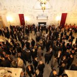 Guests gather in the Great Hall of the Metropolitan Club for the start of luncheon